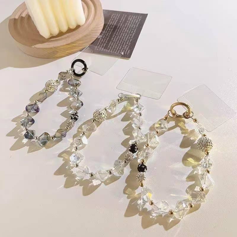 Creative Crystal & Diamond-encrusted Irregular-shaped Phone Charms for Women. These delicate and high-end adornments double as mobile phone case pendants and car keychains
