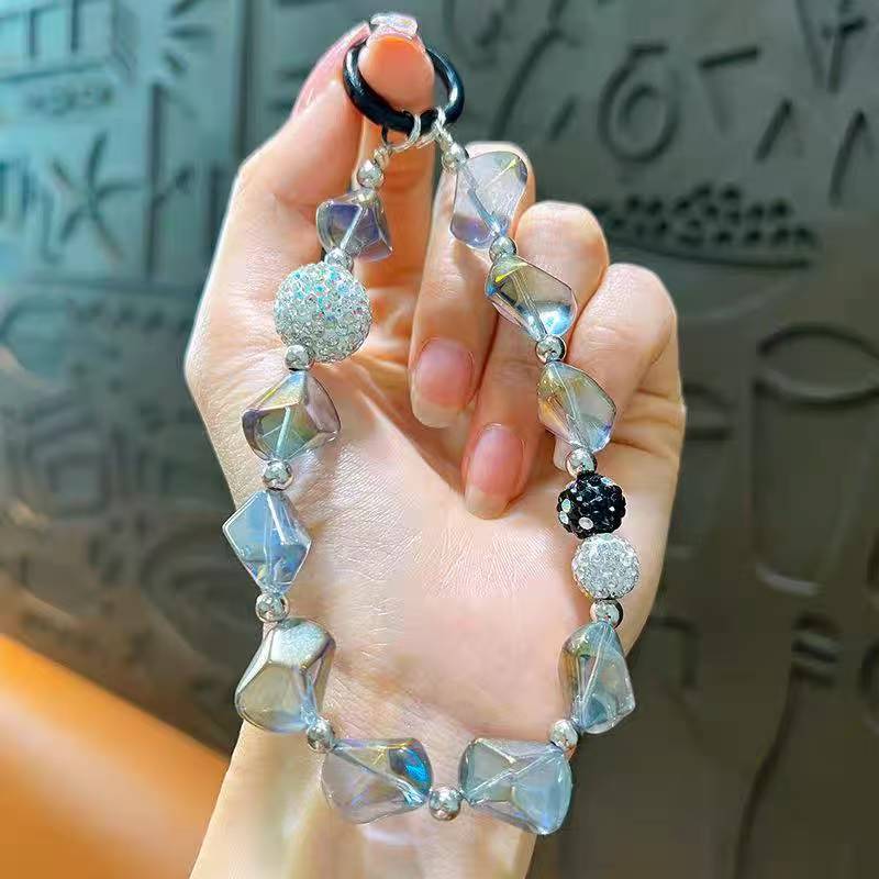 Creative Crystal & Diamond-encrusted Irregular-shaped Phone Charms for Women. These delicate and high-end adornments double as mobile phone case pendants and car keychains