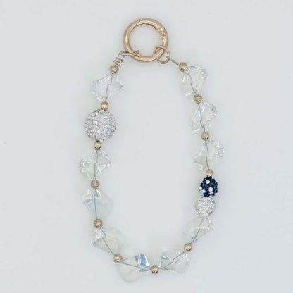 Creative Crystal & Diamond-encrusted Irregular-shaped Phone Charms for Women. These delicate and high-end adornments double as mobile phone case pendants and car keychains