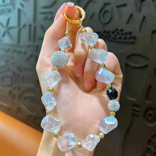 Creative Crystal & Diamond-encrusted Irregular-shaped Phone Charms for Women. These delicate and high-end adornments double as mobile phone case pendants and car keychains