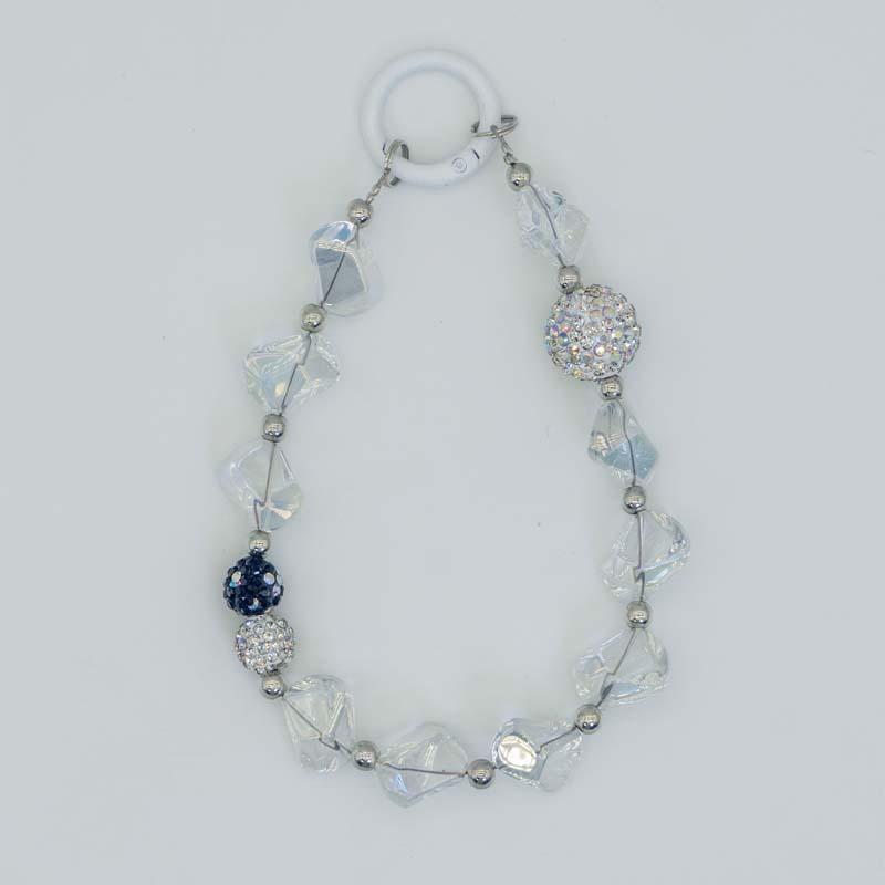 Creative Crystal & Diamond-encrusted Irregular-shaped Phone Charms for Women. These delicate and high-end adornments double as mobile phone case pendants and car keychains