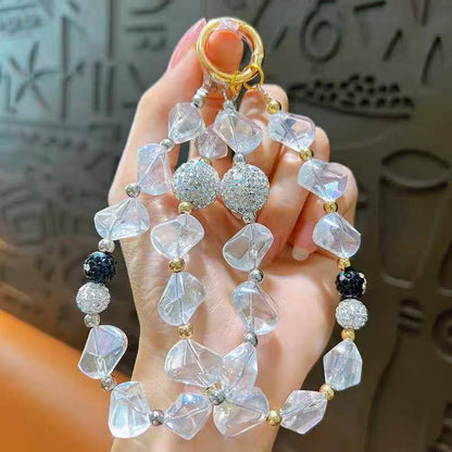 Creative Crystal & Diamond-encrusted Irregular-shaped Phone Charms for Women. These delicate and high-end adornments double as mobile phone case pendants and car keychains